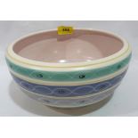 A Poole pottery fruit bowl, painted with bands in blue, grey and turquiose. 9½' diam