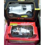 Four Burago 1/18th diecast models, Alfa Romeo 2300 Spider; Jaguar SS100, Porsche 356B Coupe and a