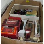 A collection of boxed and unboxed diecast vehicles