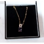 An amethyst and diamond pendant and chain. In gold marked 375. 3.1g