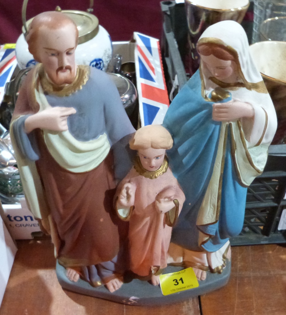 A plaster Holy Family group