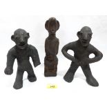 Three African fetish figures, the pair 8½' high