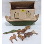 An early 20th century painted pine model of Noah's Ark, to include six carved pine animals. 17'