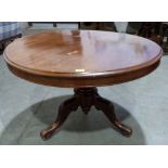 A Victorian mahogany snap-top supper table on tripod support. 39' diam