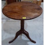 A 19th century mahogany snap-top tripod table. 24½' diam.