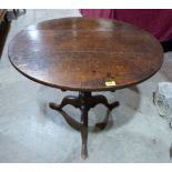 A George III oak snap-top tripod table. 32½' diam