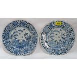 Two Chinese export porcelain plates each similarly decorated in blue and white with birds, foliage