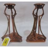 A pair of copper and brass secessionist openwork candlesticks. 7' high