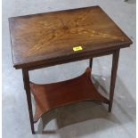 An Edward VII mahogany card table with green baize lined fold-over marquetry inlaid top. 21½' wide