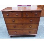A Victorian mahogany chest of two short over three long drawers, on turned feet