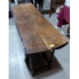 An early 18th century joined oak gateleg table on turned legs. 47' wide