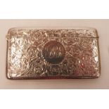 A Victorian silver card case with chased decoration and engraved initials. Birmingham 1897. 3¼'