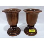 A pair of turned treen goblets
