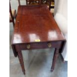 A George IV mahogany Pembroke table with frieze drawer on ring turned legs. 34' wide