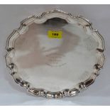 A plated salver with fly fishing engraved inscriptions. 12' diam.