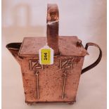 An Arts and Crafts planished copper watering can. Possibly Glasgow School. 11½' high. One foot