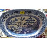 A blue and white willow pattern turkey dish. Old stapled repair. 21½' wide