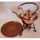 An Arts and Crafts copper kettle on burner stand by Benham & Froude after Dr. Christopher Dresser,