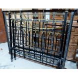 A 4'6' Edwardian brass and iron bedstead