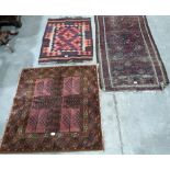 A small Kilim rug & two others