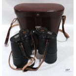 A cased pair of Carl Zeiss Jenoptem 10x50 binoculars