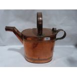 A copper watering can. 16' high