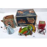 Vintage Toys. A Peak 16mm cine projector; two clockwork tinplate toys and a gyroscope