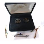 A silver bar brooch, a pair of earrings and a pair of cufflinks