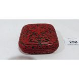 A Chinese cinnabar box, typically carved with scrolling foliage. 3' wide