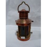 A copper marine lamp bearing maker's plate Davey + Co. London