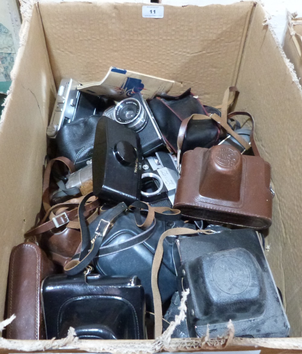 A quantity of cameras and accessories