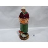 A Royal Doulton figure, The Farmer's Wife, HN2069. 9¼' high