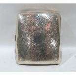 A George V silver cigarette case, chased with scrolling foliage. Birmingham 1926. 2ozs