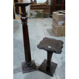 A mahogany torchere and a faux rosewood stand