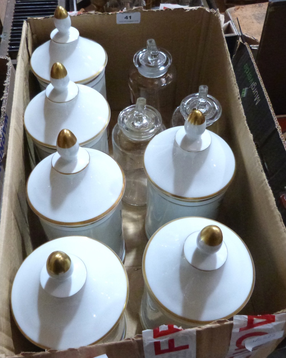 Six Limoges storage jars and three glass apothecary jars