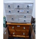 Two miniature chests of drawers
