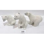 Three Lladro polar bears