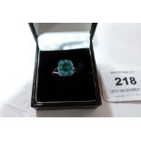 A turquoise cluster ring. In gold marked 9ct. Size N. 3.6g gross