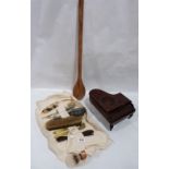 A German piano musical box, a large wooden spoon and a travelling toiletries set in textile roll