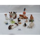 A collection of ceramic animals, Royal Doulton and other factories