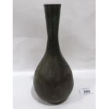 An oriental bronze baluster vase. 9' high