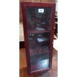 A glazed display case. 24' high