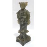 A Chinese carved green stone figure of a lady. 7¼' high