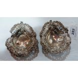 A pair of Victorian silver pierced repousse bonbon dishes of heart form. Chester 1895. 3½' long.