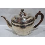A George III silver teapot of oval form with bright cut decoration. Dublin 1802. 7' high, 19ozs