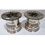 A pair of silver plated flambe burner stoves