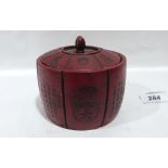 A Chinese red composition box and cover with impressed characters and decoration. 3½' high