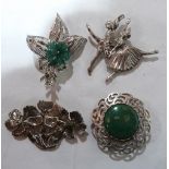 Four silver brooches