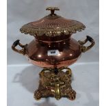 An early Victorian copper samovar with brass tap