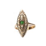 A GREEN GEM SET AND DIAMOND RING